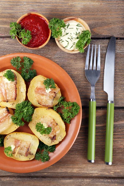 Baked potato with bacon — Stock Photo, Image