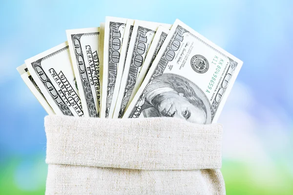 One hundred dollar bills in bag — Stock Photo, Image