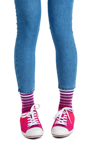 Legs in colorful socks and sneakers — Stock Photo, Image