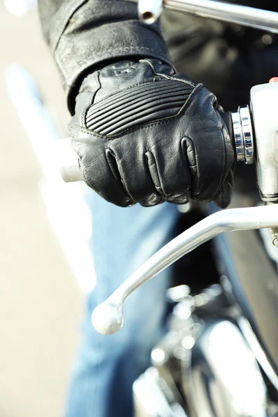 Hand rider on handlebars, close-up — Stock Photo, Image