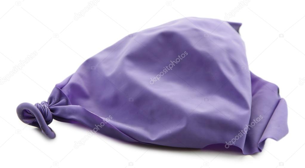 Popped violet balloon