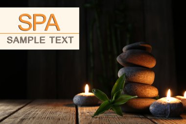 spa taşları ve mumlar