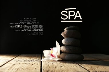 Spa taşlar ve beyaz orkide