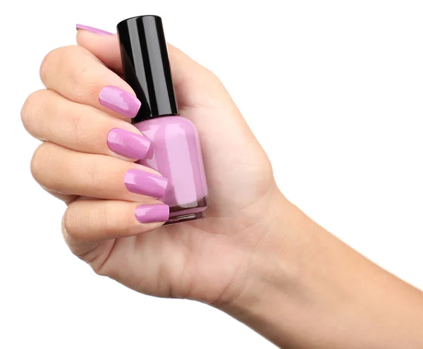 Nail polish in hand — Stock Photo, Image