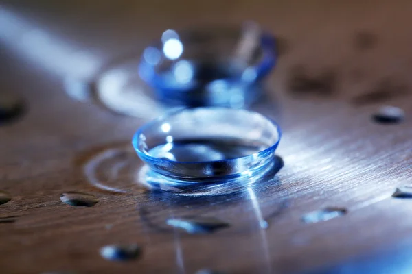 Contact lenses with water drops — Stock Photo, Image