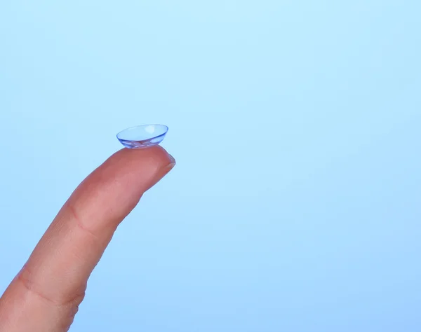 Contact lens on finger — Stock Photo, Image