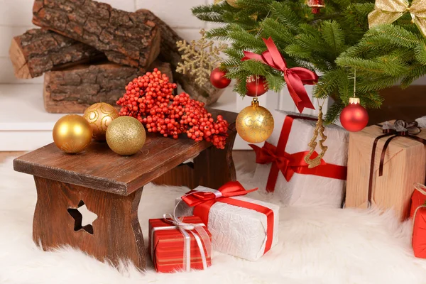 Christmas composition near fireplace — Stock Photo, Image