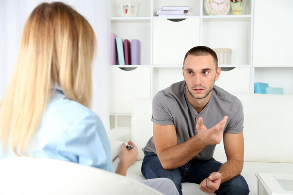 Young man on reception at psychologist