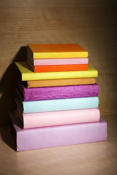 Books on wooden shelf — Stock Photo, Image