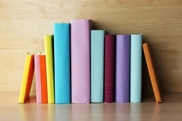 Books on wooden shelf — Stock Photo, Image