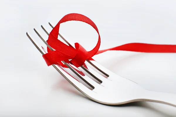 Scener med knyta rosett på gaffeln — Stockfoto