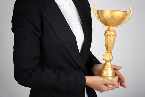 Woman holding trophy cup — Stock Photo, Image