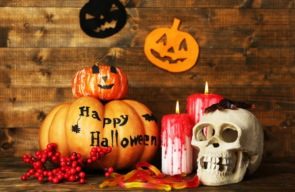 Halloween pumpkins and candles — Stock Photo, Image