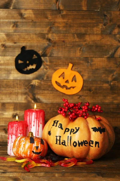 Halloween pumpkins and candles — Stock Photo, Image