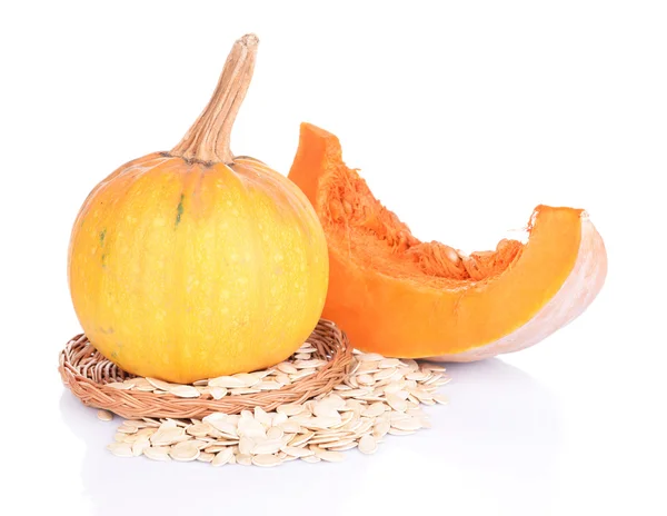 Pumpkin and seeds isolated on white — Stock Photo, Image