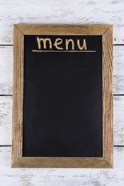 Inscription menu on chalkboard on table close-up — Stock Photo, Image