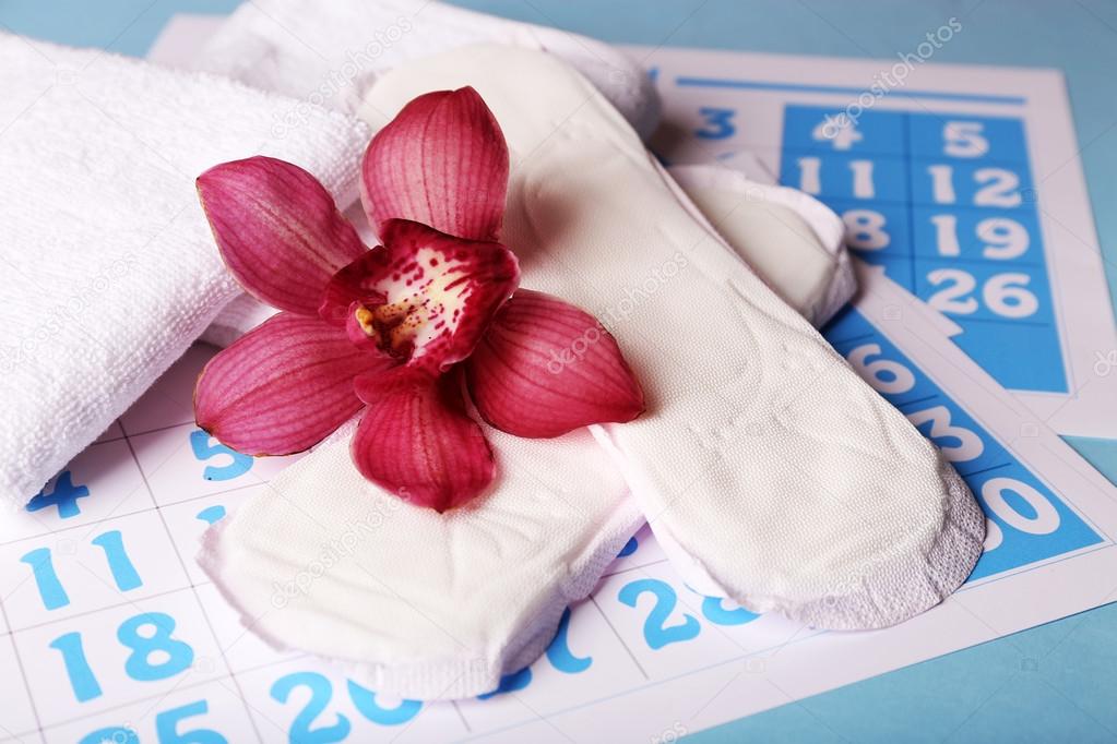 Sanitary pads and lilac orchid