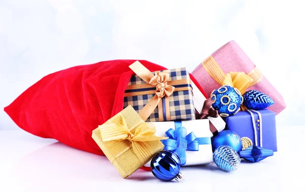 Red bag with Christmas toys — Stock Photo, Image