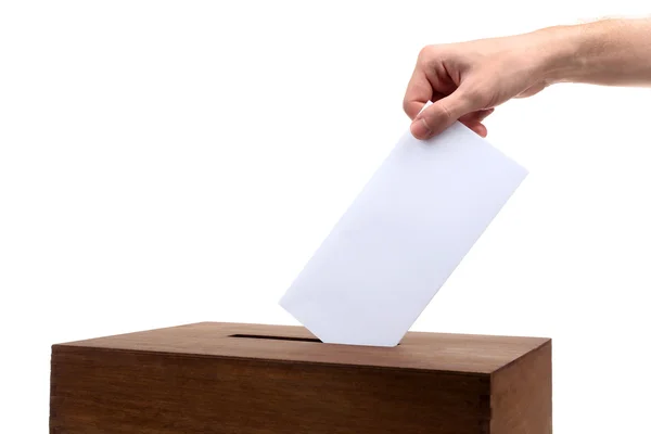 Human hand with envelope in mailbox — Stock Photo, Image