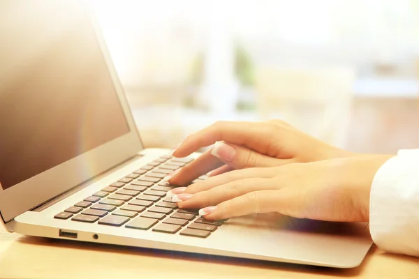 Female hands on laptop — Stock Photo, Image