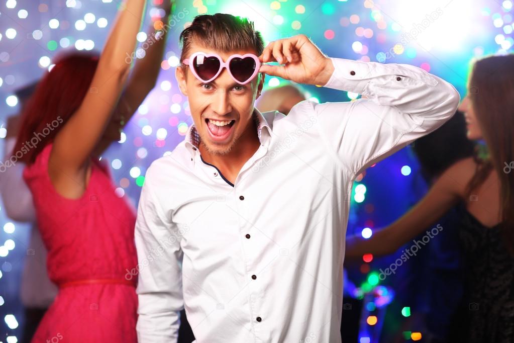 Young people dancing at party 