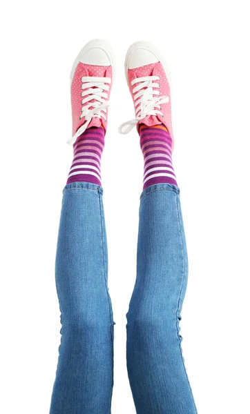 Legs in colorful socks and sneakers — Stock Photo, Image