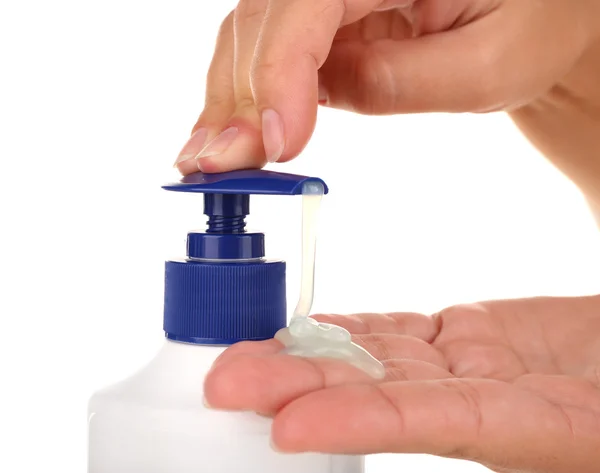Kobiece ręce przy użyciu płynne mydło na białym tle — Zdjęcie stockowe