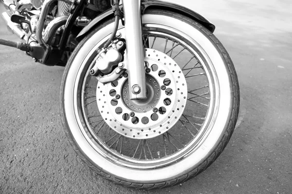 Motorcycle forks and tire, close-up Stock Image