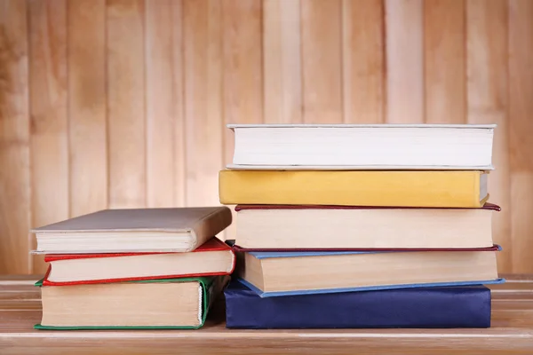 Books on wooden table — Stock Photo, Image