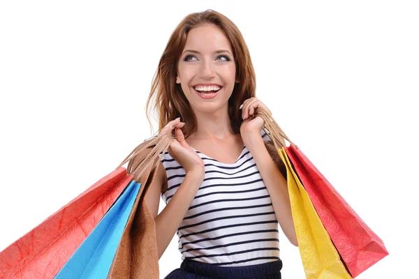 Bela jovem mulher com sacos de compras isolado no branco — Fotografia de Stock