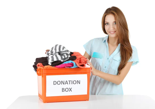 Girl volunteer with donation box  isolated on white — Stock Photo, Image