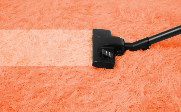 Vacuum cleaner to tidy up carpet — Stock Photo, Image
