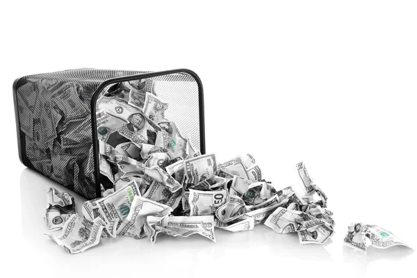 Money in dustbin isolated on white — Stock Photo, Image