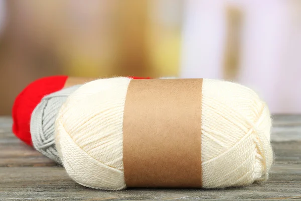 Knitting yarn on wooden table — Stock Photo, Image