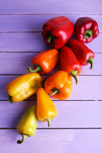 Pepper on wooden background — Stock Photo, Image