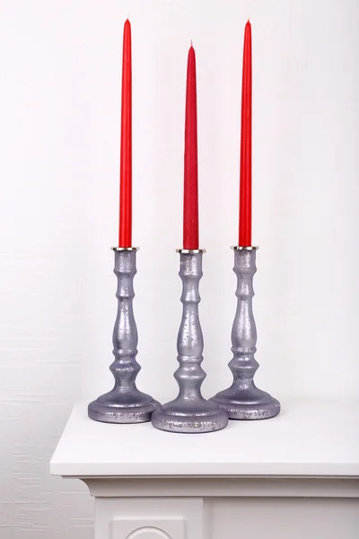 Red candles in candle holders