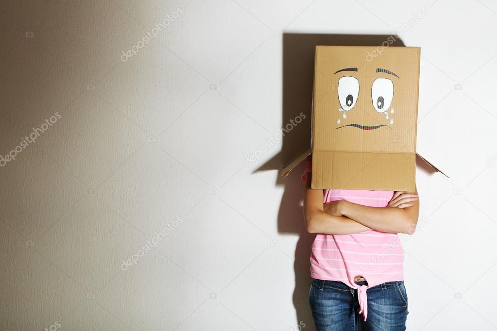 Woman with cardboard box