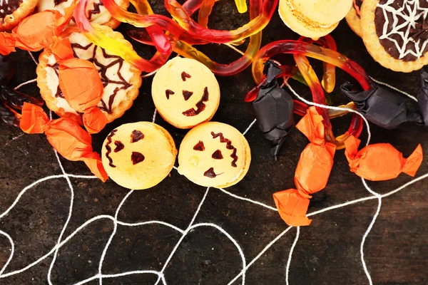 Różne słodycze na imprezie z okazji Halloween — Zdjęcie stockowe