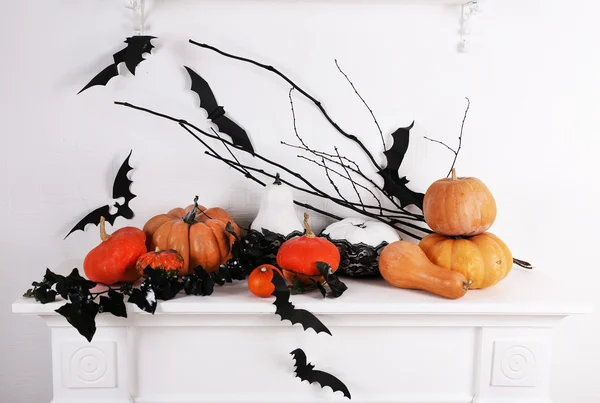 Halloween composition on fireplace — Stock Photo, Image