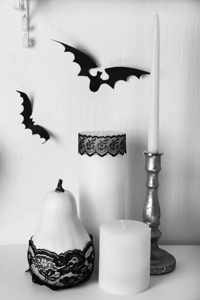 Candles and paper bats — Stock Photo, Image