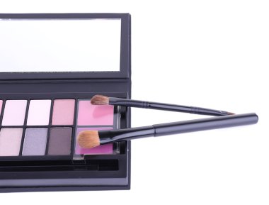 Eyeshadow set and brushes isolated on white