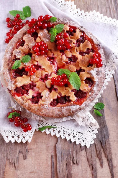 Tasty cake with berries on table close-up — Stock Photo, Image