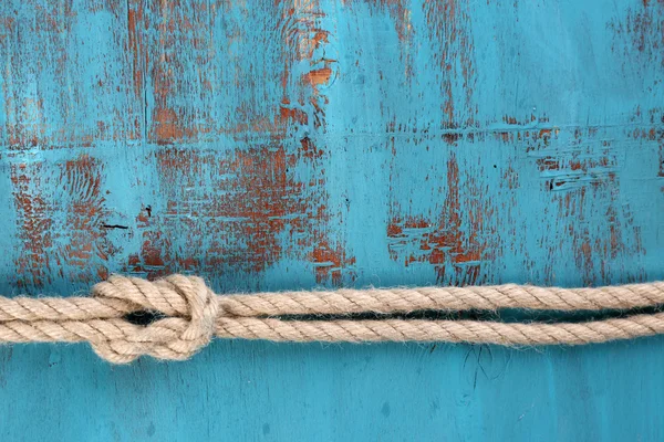 Marine Knoten auf Holz Hintergrund — Stockfoto