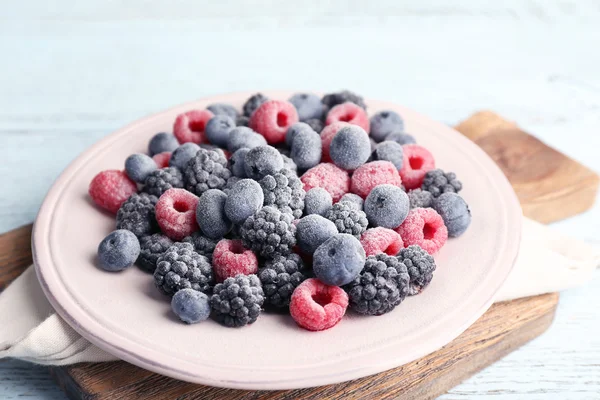 Iced berries on plate — Stock Photo, Image