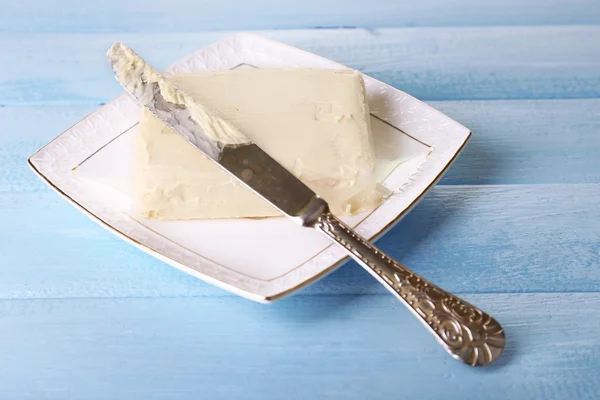 Fresh butter on plate — Stock Photo, Image