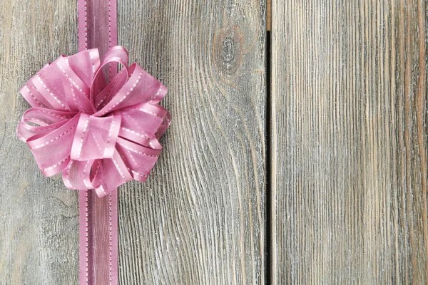 Beautiful bow on wood — Stok fotoğraf