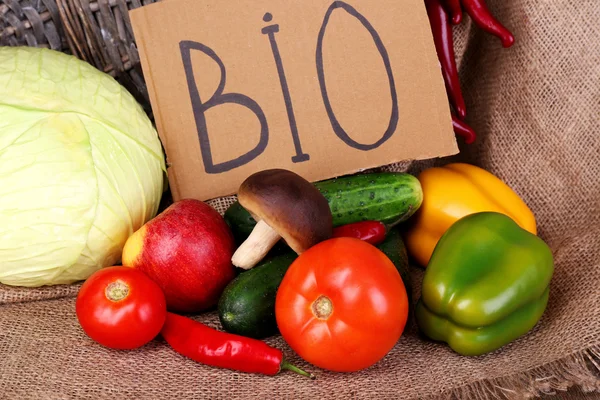 Organic vegetables and fruits on wooden background — Stock Photo, Image