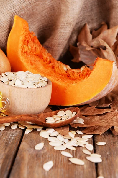 Pumpkins and pumpkin seeds — Stock Photo, Image