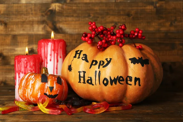 Halloween pumpkins and candies — Stock Photo, Image