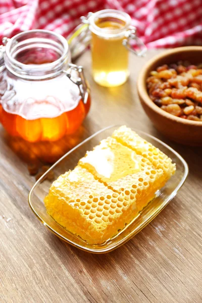 Fresh honey on wooden table — Stock Photo, Image